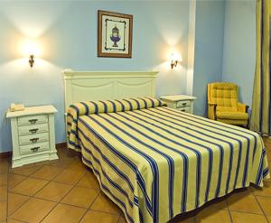 A bed or beds in a room at Los Bronces