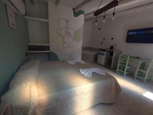 Postel nebo postele na pokoji v ubytování Sierras Alojamiento SUITE