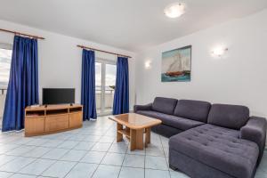 Televízia a/alebo spoločenská miestnosť v ubytovaní Apartments with a parking space Moscenicka Draga, Opatija - 7766