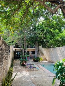 Piscina a Hotelito YUM KAAX o a prop