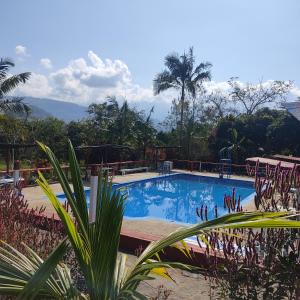 A view of the pool at Agradable casa de campo con piscina, campo de tejo or nearby