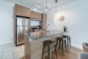 Dapur atau dapur kecil di Charmant loft - 20 MIN à pied Vieux-Québec !