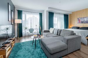 Ruang duduk di Charmant loft - 20 MIN à pied Vieux-Québec !