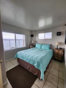 Cama ou camas em um quarto em Plainview Motel