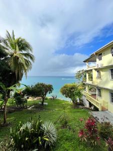 a building with a view of the ocean at Casa del Vega a Little Peace of Heaven in Castries