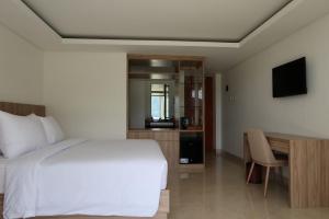 Et tv og/eller underholdning på Rusa by The Lake