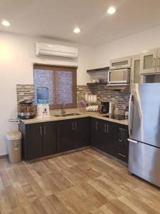 Dapur atau dapur kecil di Condo en Torres Cantera de 2 recámaras 2 1/2 baños