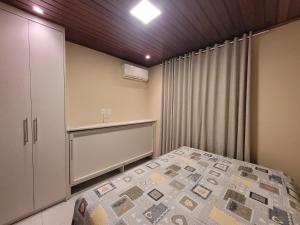 Ένα ή περισσότερα κρεβάτια σε δωμάτιο στο Condominio Winterville 3 Quartos +58 φωτογραφίες