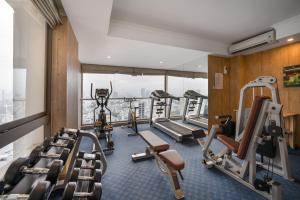 a gym with cardio equipment in a hotel room at Diamond Sea Hotel in Danang
