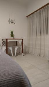 Ένα ή περισσότερα κρεβάτια σε δωμάτιο στο MONOAMBIENTE NORDICO