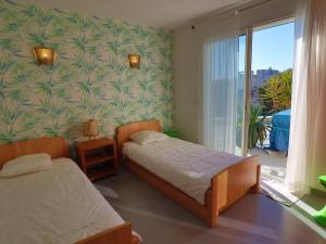 Fotografia z galérie ubytovania Villa climatisée indépendante avec jardin et WIFI, proche plage et commerces à Sète, quartier Villeroy - FR-1-472-176 v destinácii Sète