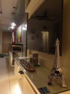 a model of the eiffel tower on a kitchen counter at Luxurious Family Room Pico de Loro in Nasugbu