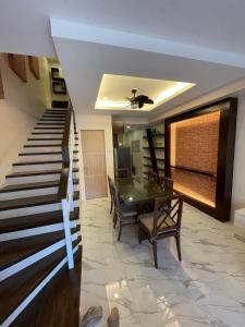 Istumisnurk majutusasutuses Luxurious Family Room Pico de Loro