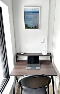 a desk with a laptop computer on top of it at 1406 Sainte Elisabeth in Montreal