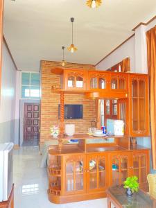 Kuchyň nebo kuchyňský kout v ubytování Kp. เพลส หลวงแพ่ง (Kp. Place Luang Phaeng)