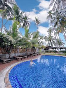 Πισίνα στο ή κοντά στο The Legend Coco Beach +69 φωτογραφίες