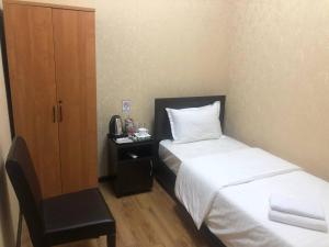 Postel nebo postele na pokoji v ubytování Hayot Hostel