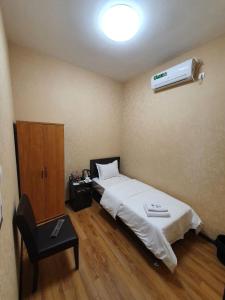 Postel nebo postele na pokoji v ubytování Hayot Hostel