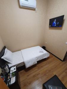 TV a/nebo společenská místnost v ubytování Hayot Hostel