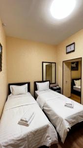 Postel nebo postele na pokoji v ubytování Hayot Hostel