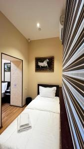 Postel nebo postele na pokoji v ubytování Hayot Hostel