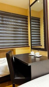 Postel nebo postele na pokoji v ubytování Hayot Hostel
