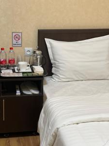 Postel nebo postele na pokoji v ubytování Hayot Hostel