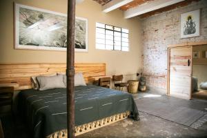 a bedroom with a bed in a room at 509 Accommodation in Oaxaca City
