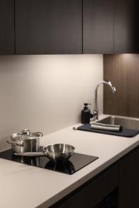 Kuchyňa alebo kuchynka v ubytovaní Apartamenty Legionów- A27 komfortowy apartament w centrum miasta