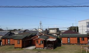 un grupo de casas en una ciudad en Koinami en Shima