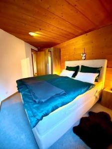 Postel nebo postele na pokoji v ubytování Ferienwohnung Aareschlucht - Erholung ab 2 Nächten