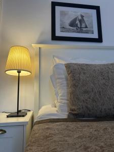 A bed or beds in a room at Just Studios