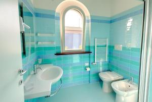 Koupelna v ubytování La Piazzetta Affittacamere B&B + 21 fotografií