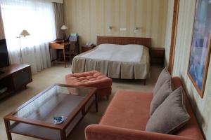Postel nebo postele na pokoji v ubytování Hotel Druzhba