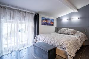 Posteľ alebo postele v izbe v ubytovaní Maison de village Carcès