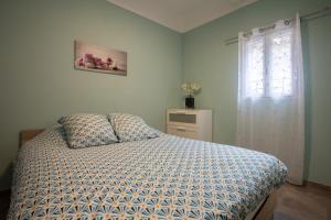 Posteľ alebo postele v izbe v ubytovaní Maison de village Carcès