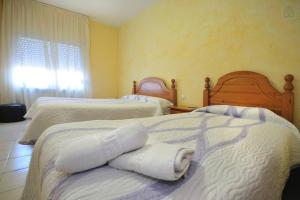 Postel nebo postele na pokoji v ubytování Pensio l'Avi Pep