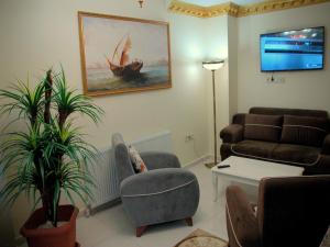 Posezení v ubytování Tolga Hotel