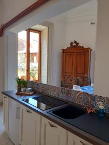 Η κουζίνα ή μικρή κουζίνα στο Bellini Apartment