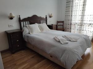 Ένα ή περισσότερα κρεβάτια σε δωμάτιο στο Mirador de Cerler -Puro Pirineo