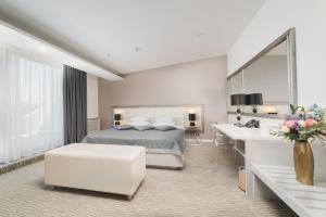 Postel nebo postele na pokoji v ubytování Hotel Aurel + 37 fotografií