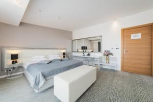 Una cama o camas en una habitación de Hotel Aurel
