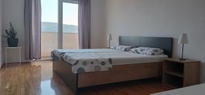 Posteľ alebo postele v izbe v ubytovaní Studio apartment with balcony