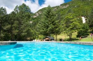 Bazén v ubytování Hotel Caldas nebo v jeho okolí