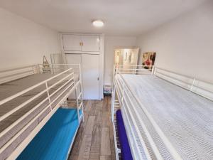 Postel nebo postele na pokoji v ubytování C ZARAGOZA JUNTO PLAYA 100m