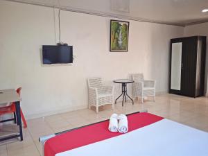 Hotel Bambu Kuning客房内的一张或多张床位