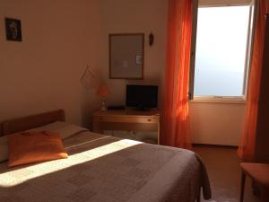 Afbeelding uit fotogalerij van Hotel Plinio in Lenno +30 foto's