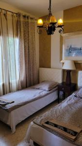 Łóżko lub łóżka w pokoju w obiekcie Villa Vid-Bil Calpe