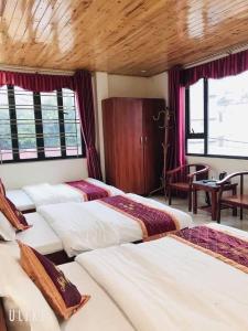 Postel nebo postele na pokoji v ubytování May Hong Hotel