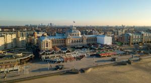 an aerial view of a large city with buildings at Helena at Sea Apartments in Scheveningen